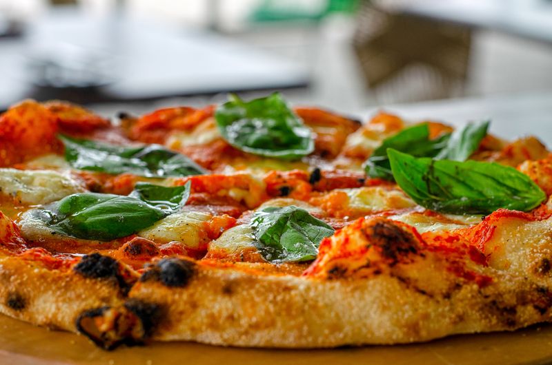 Wood-fired pizza with fresh toppings